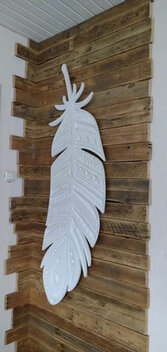 Large white carved feather
